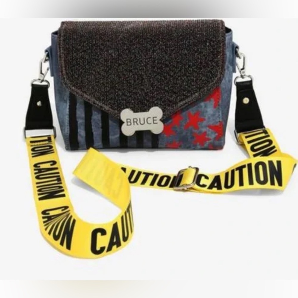 Birds of Prey Harley Quinn
Caution Tape 
Harley Quinn Bioworld Crossbody Bags